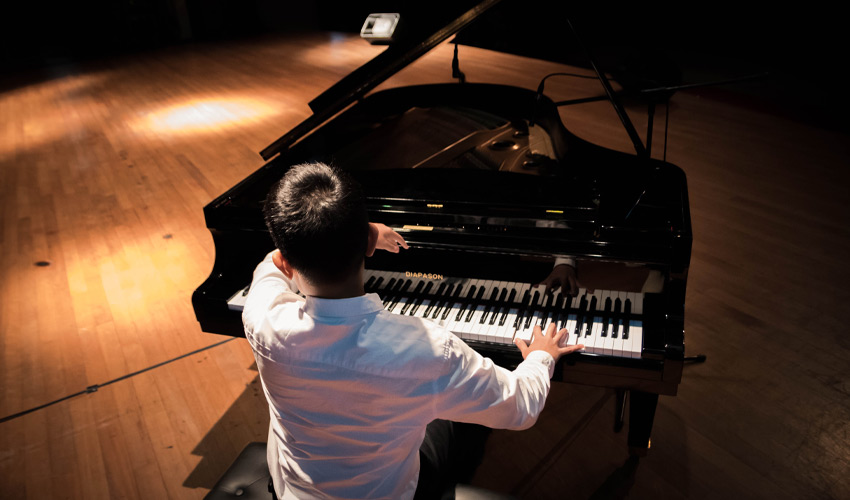 A man playing piano.